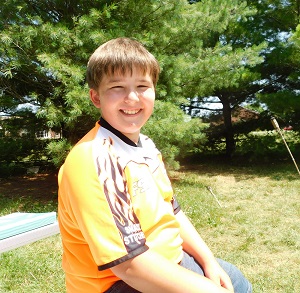 Boy Smiling at Camp