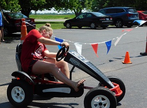 Child Racing a Go Cart